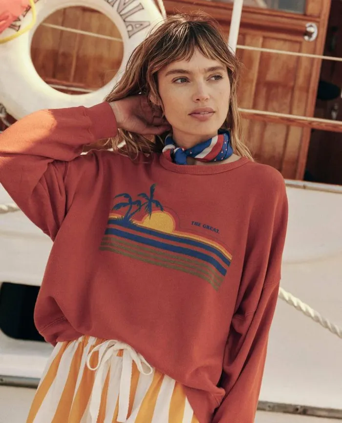 CollectionTees and Sweats The Great The Teammate Sweatshirt Burnt Red With Sunset Graphic CollectionTees and Sweats The Great The Teammate Sweatshirt Burnt Red With Sunset Graphic