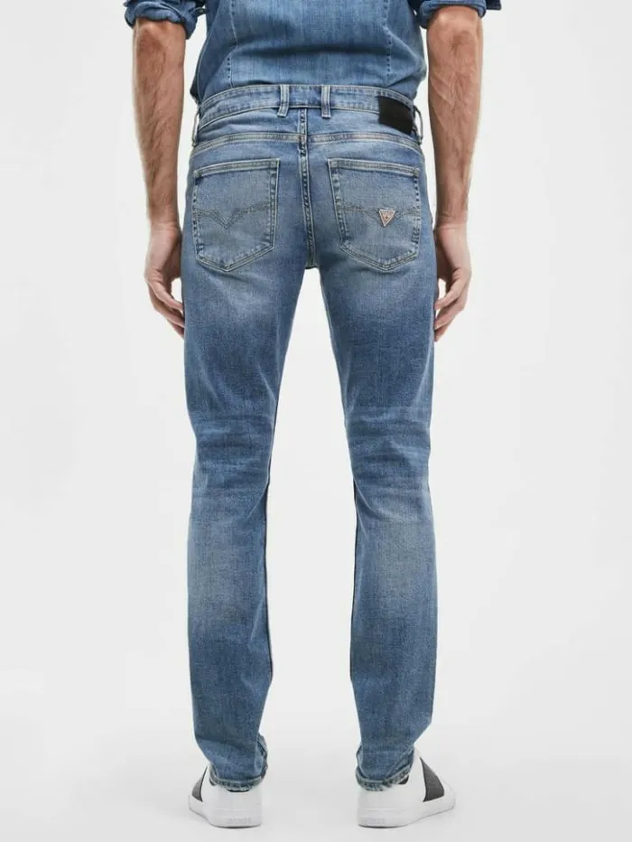 Men GUESS Jeans and Denim Distressed Tapered Jeans Light Tide Wash