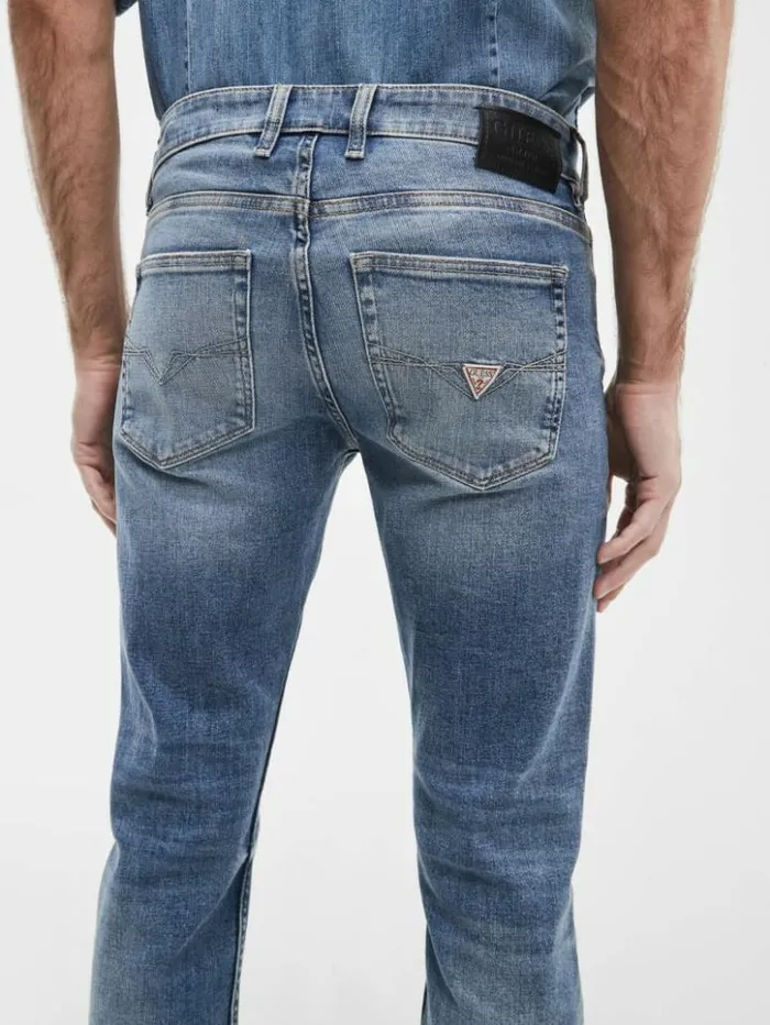 Men GUESS Jeans and Denim Distressed Tapered Jeans Light Tide Wash