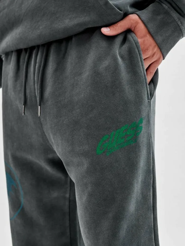 Men GUESS Pants and Shorts GUESS Originals X Batman Graphic Joggers Jet Black Multi Men GUESS Pants and Shorts GUESS Originals X Batman Graphic Joggers Jet Black Multi