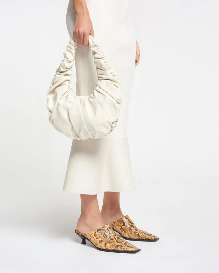 Nanushka Bags WomenMen ANJA BAGUETTE Ruched Patent Altleather Shoulder Bag Cream Nanushka