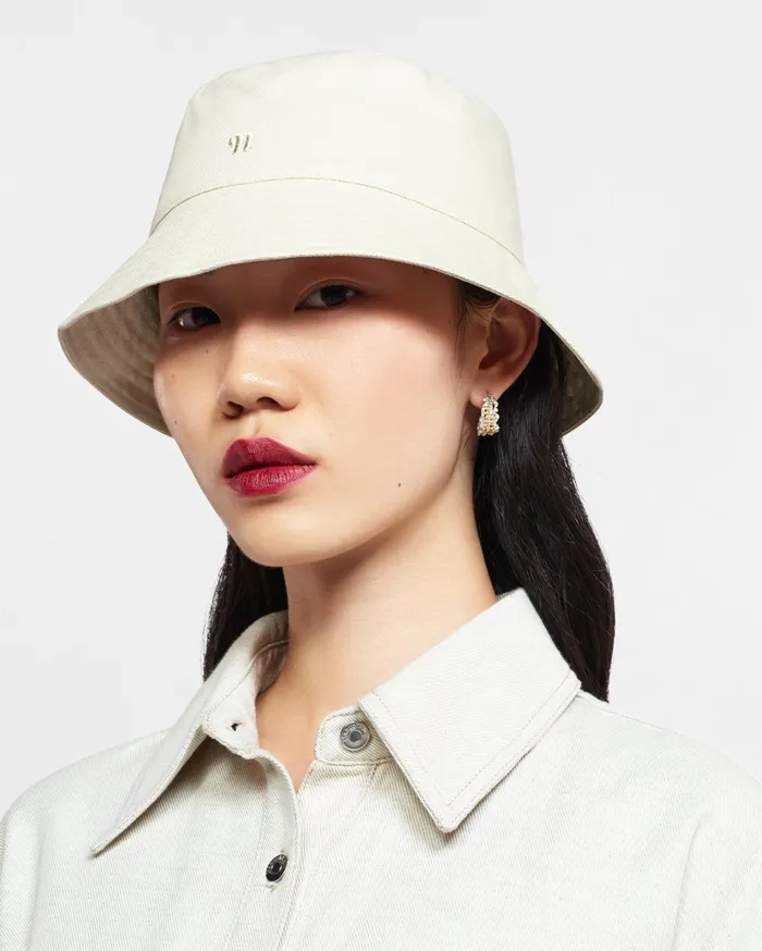 Nanushka Hats and Caps WomenMen Caran CottonCanvas Bucket Hat Shell Symbol